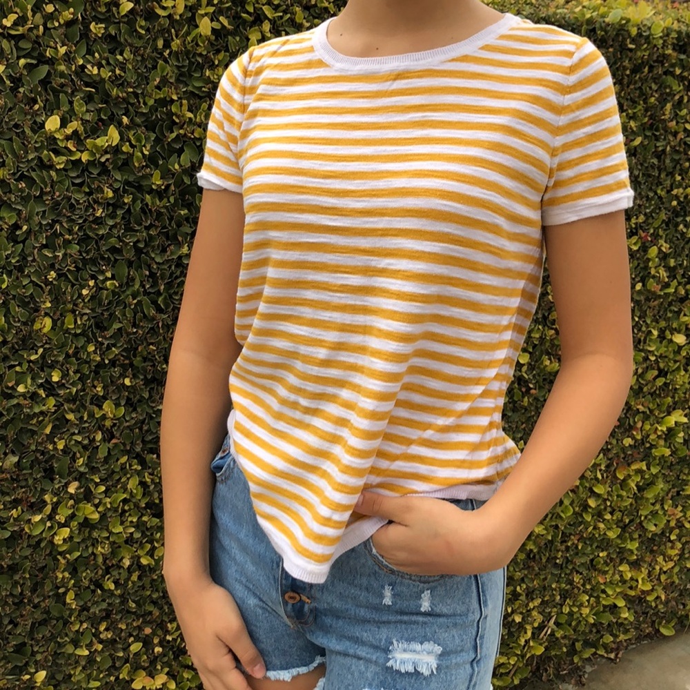 white and yellow shirt